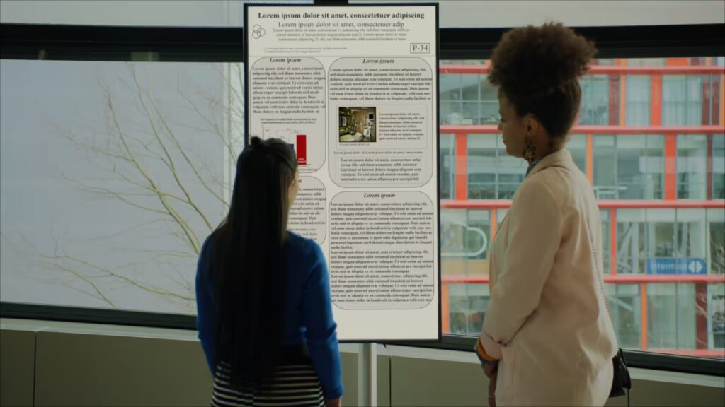 Attendees looking at an ePosterscreen in fullscreen mode